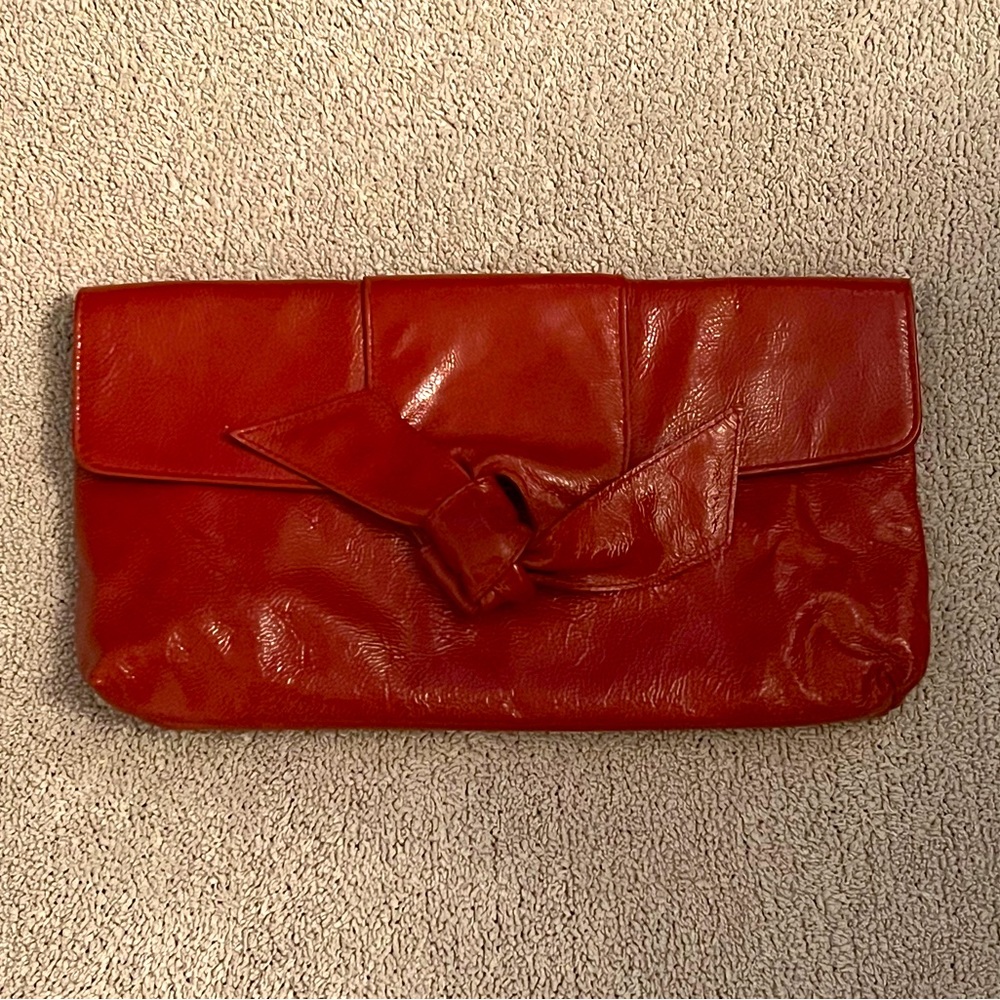 Furla clutch with bow detail